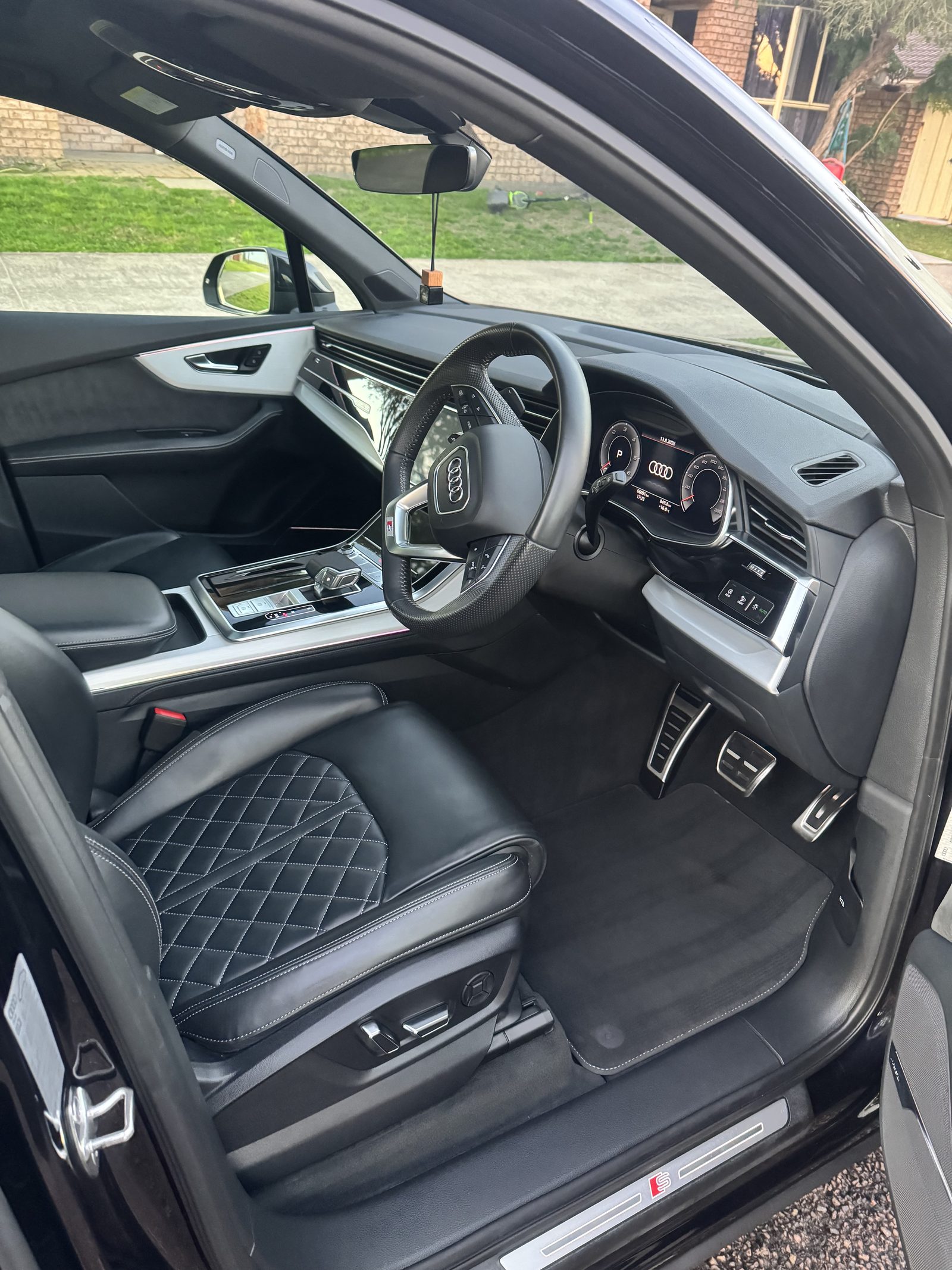 Audi interior detail with cleaned leather seats by Top Grade Mobile Detailing