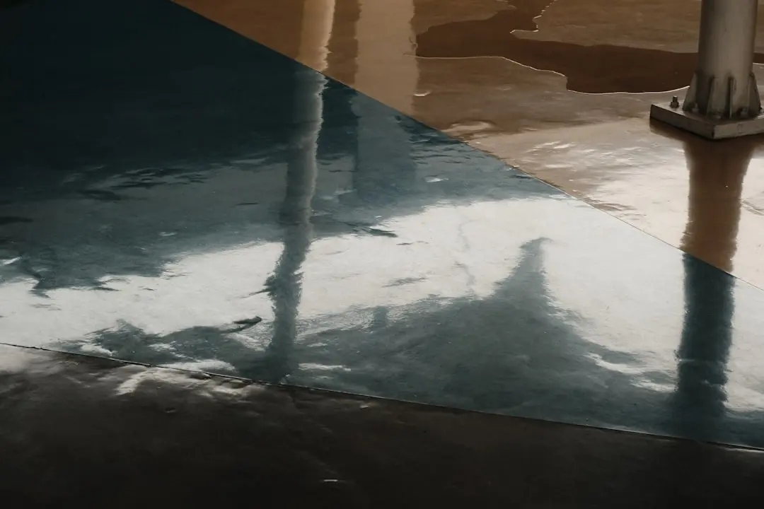 High performance epoxy floor coating installed by Elite Spray Foam to protect concrete surfaces from wear and damage