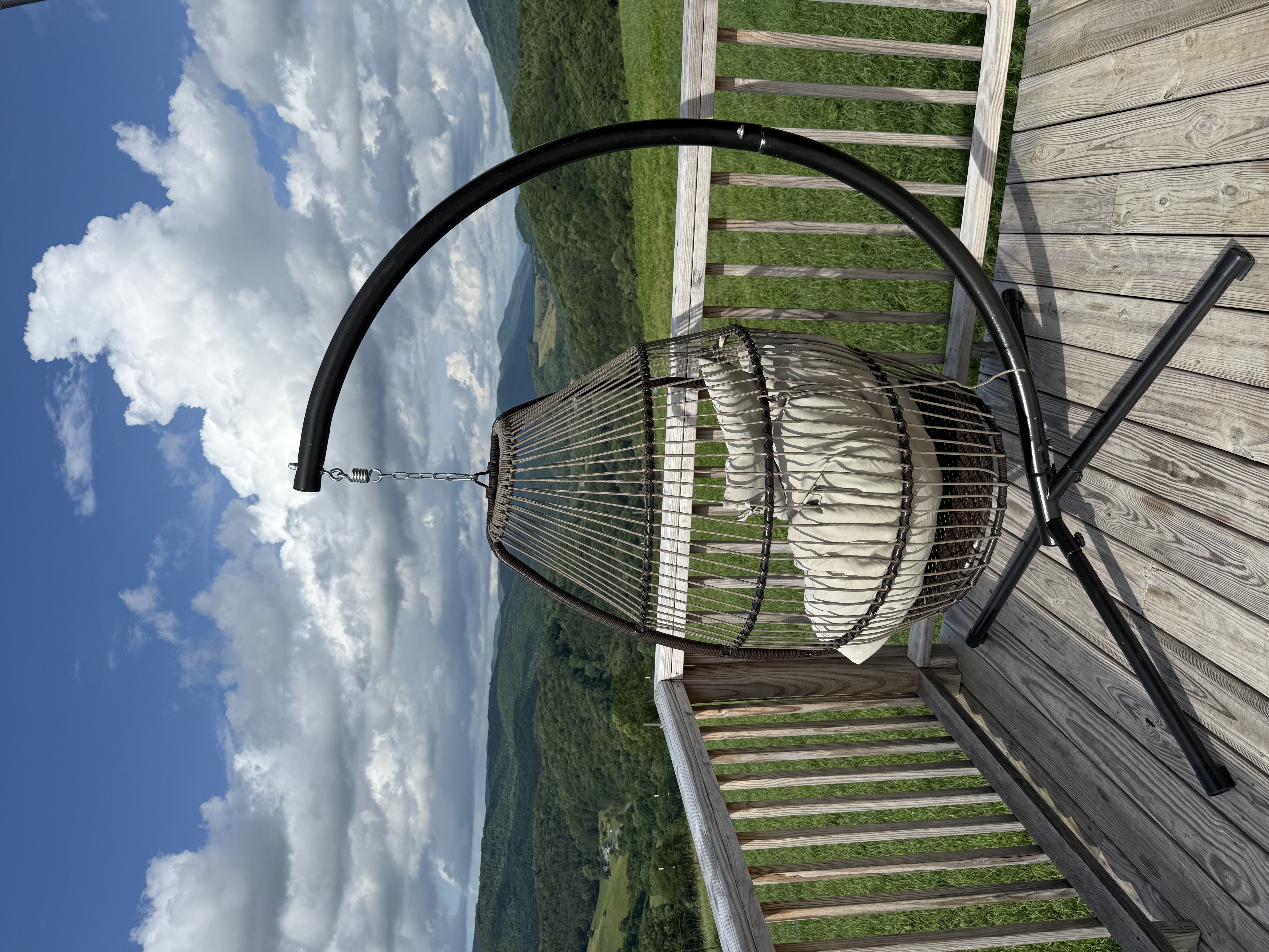 Welcoming rustic mountain cabin with a front porch at Pride's Mountain farm stay in Bastian, Virginia