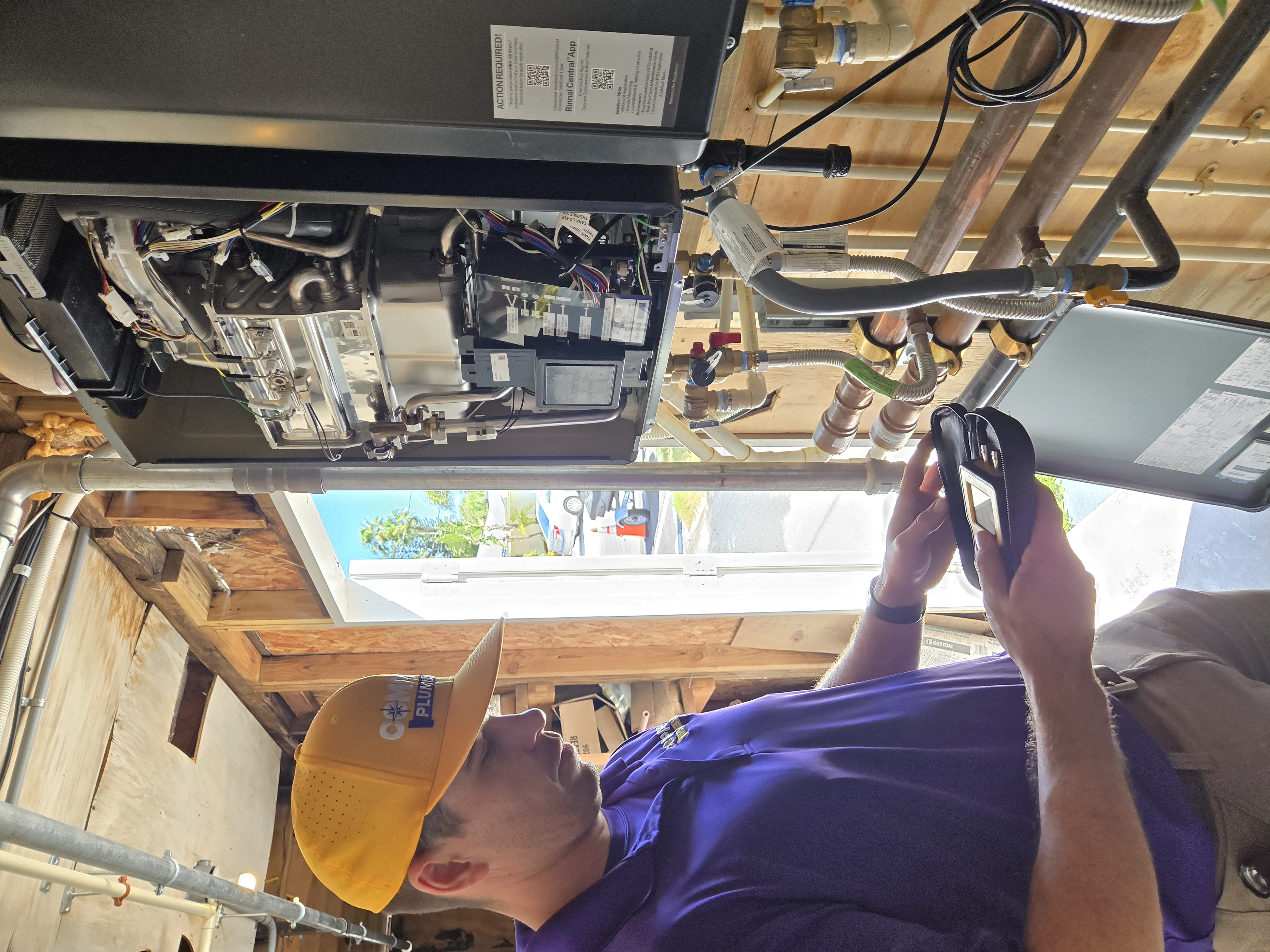Compass Plumbing technician on the job in New Port Richey
