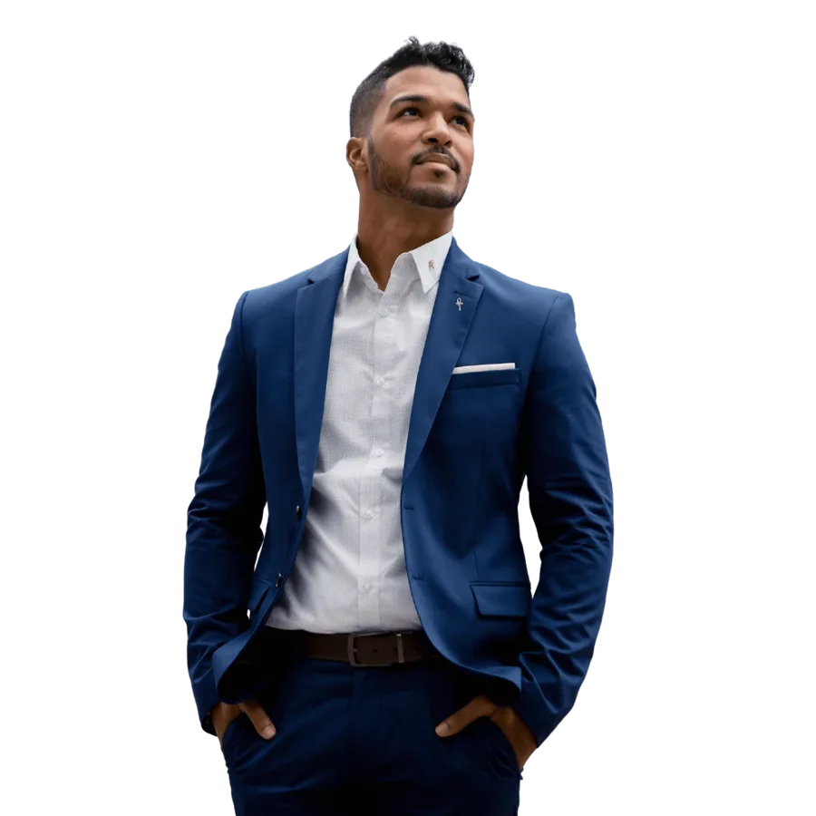 Ralph standing in a blue suit, hands in pockets, looking up