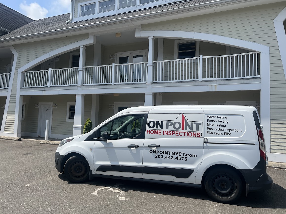On Point Home Inspections - Connecticut Home Inspection inspector reviewing findings