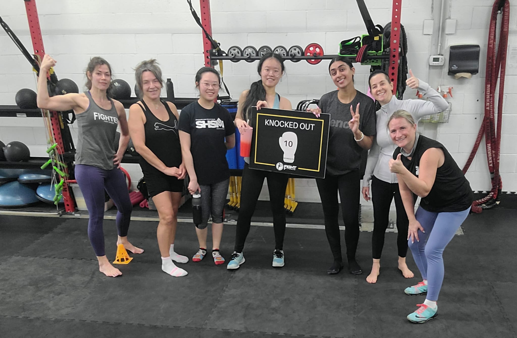 Chanpreet Sandhu smiling after her 10th fitness class, showcasing her building consistency and improved endurance as she works toward her 8-pound weight loss goal.