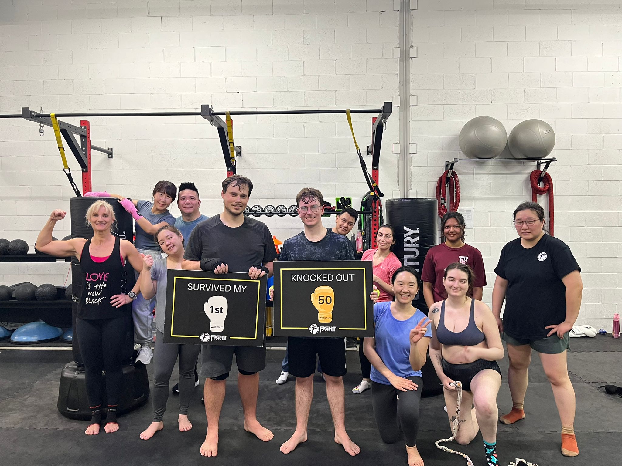 Mac celebrating his 50th class milestone at Fight Fitness after losing 10 pounds and transforming his fitness through kickboxing and coaching support. Mac celebrating his 50th class milestone at Fight Fitness after losing 10 pounds and transforming his fitness through kickboxing and coaching support.