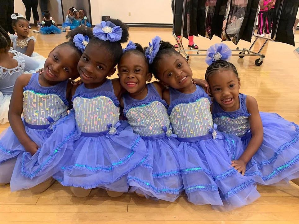 Young dancers performing on stage at the annual recital