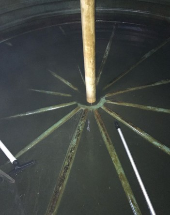 Dirty rainwater tank before cleaning