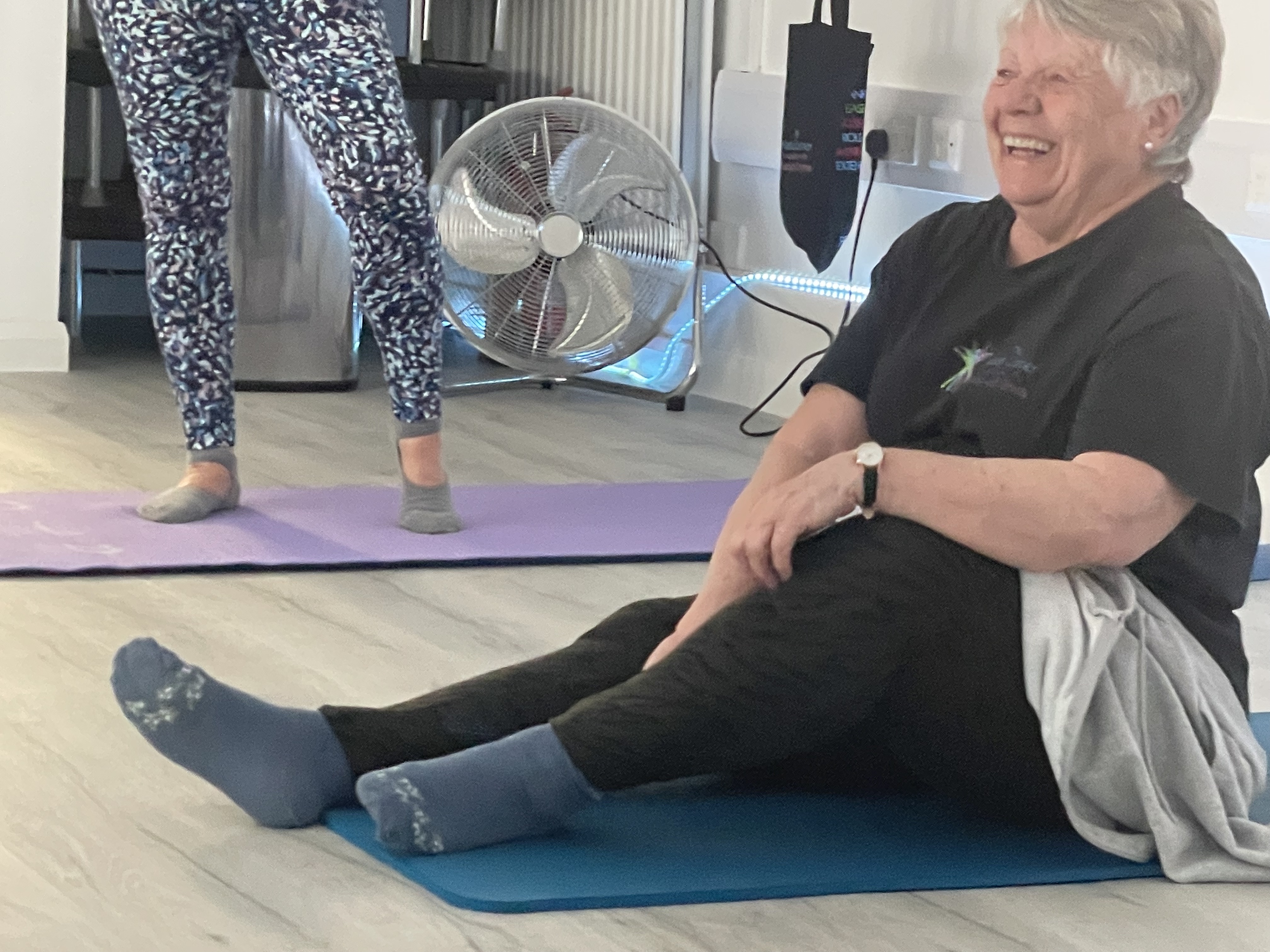 Members enjoying a small group mat Pilates class in North Hertfordshire