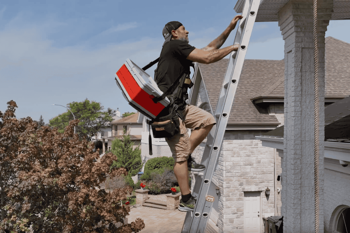 Best damn roofer climbing a ladder