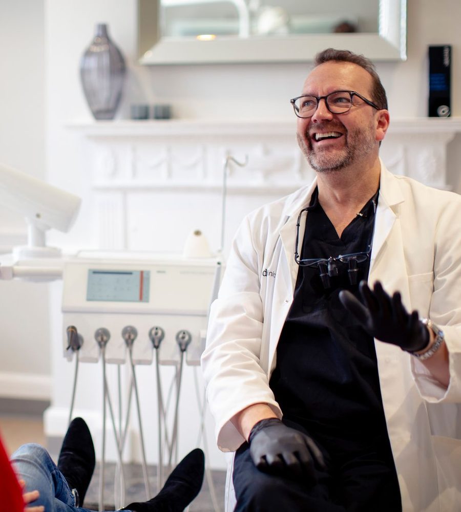 Mark Hughes with a patient during a consultation at Canon House Clinic
