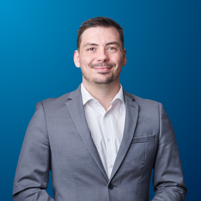 A headshot of Grant Cooke