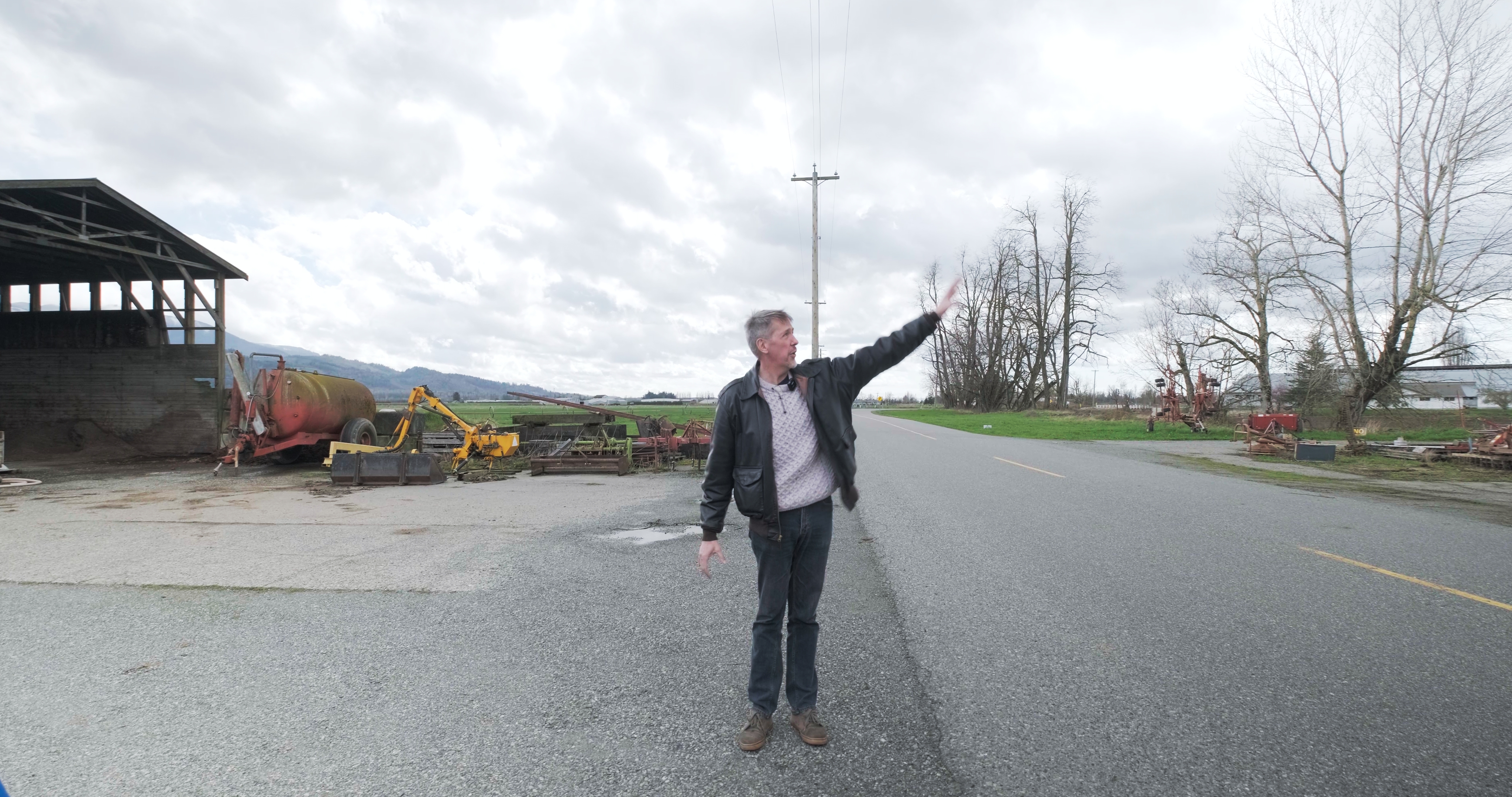 Standing on the road at Sumas Prairie, retracing the route