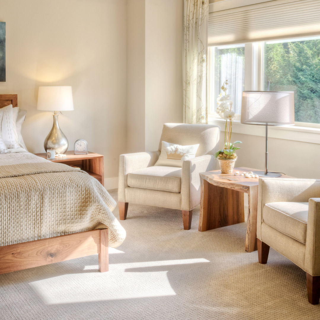 a bedroom with a bed and a ceiling fan