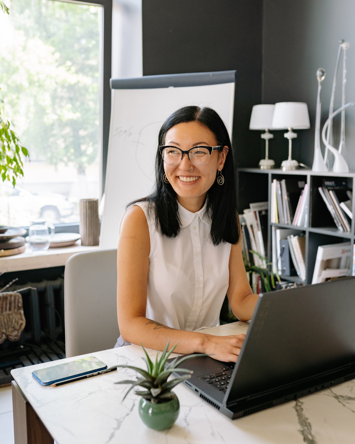 Professional woman reflecting on her career and next promotion