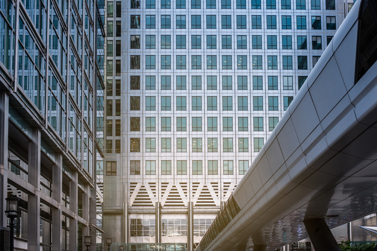 Modern office building interior courtyard representing structured real estate investment planning