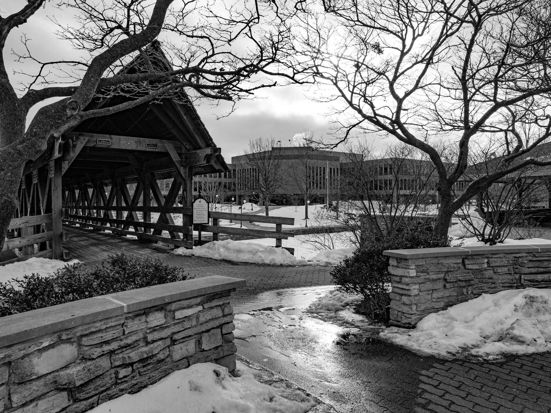 Covered bridge on the Naperville Riverwalk in winter