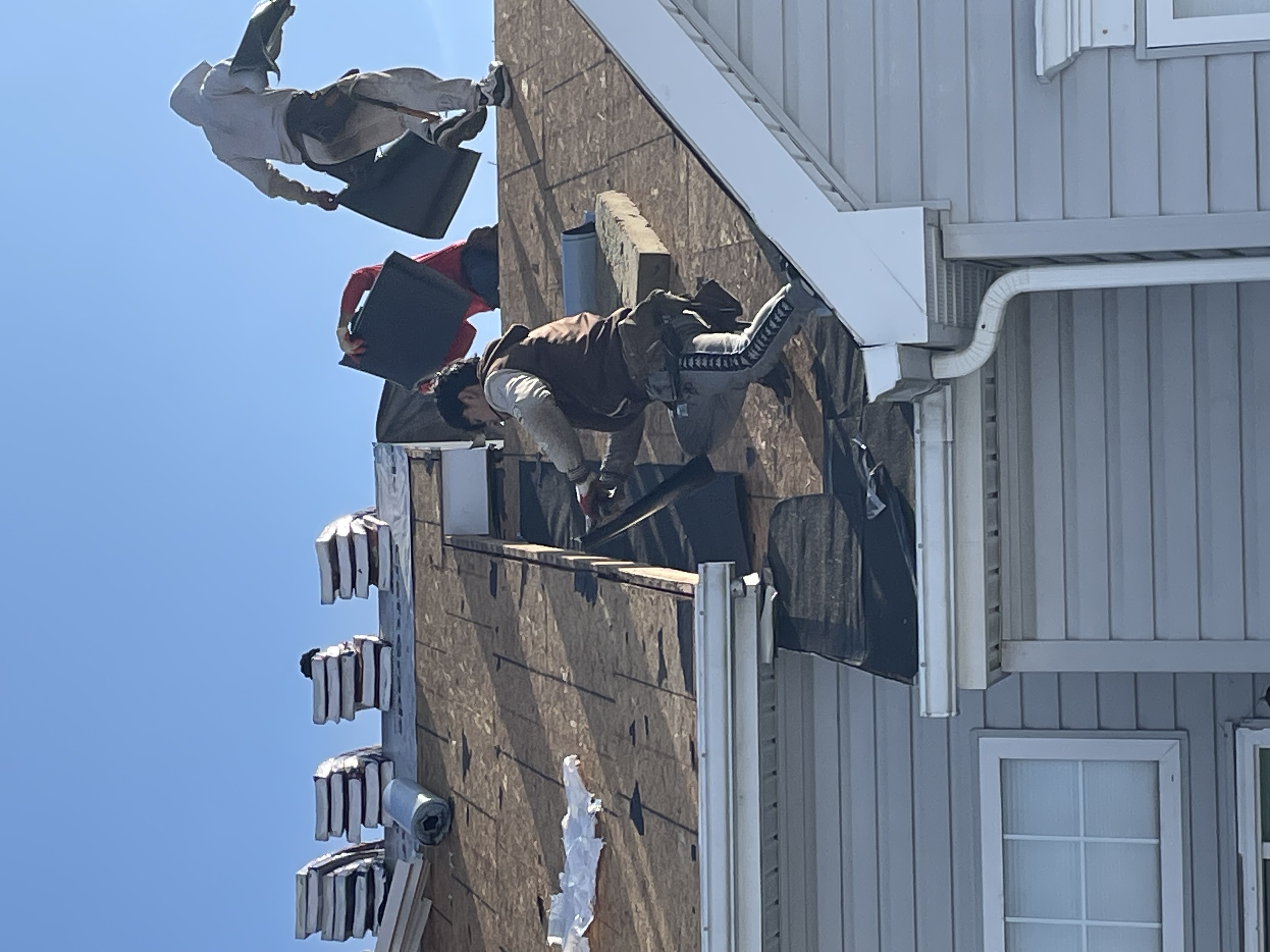 Roofing crew at work