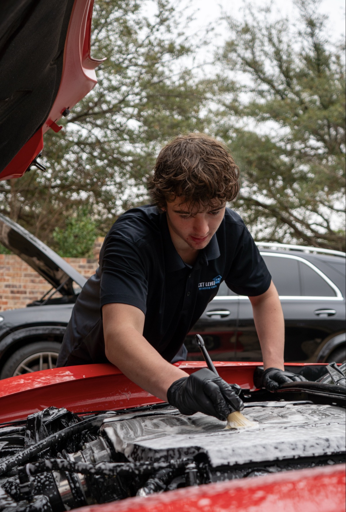 Next Level Mobile Detailing technician detailing a vehicle in Colleyville, TX
