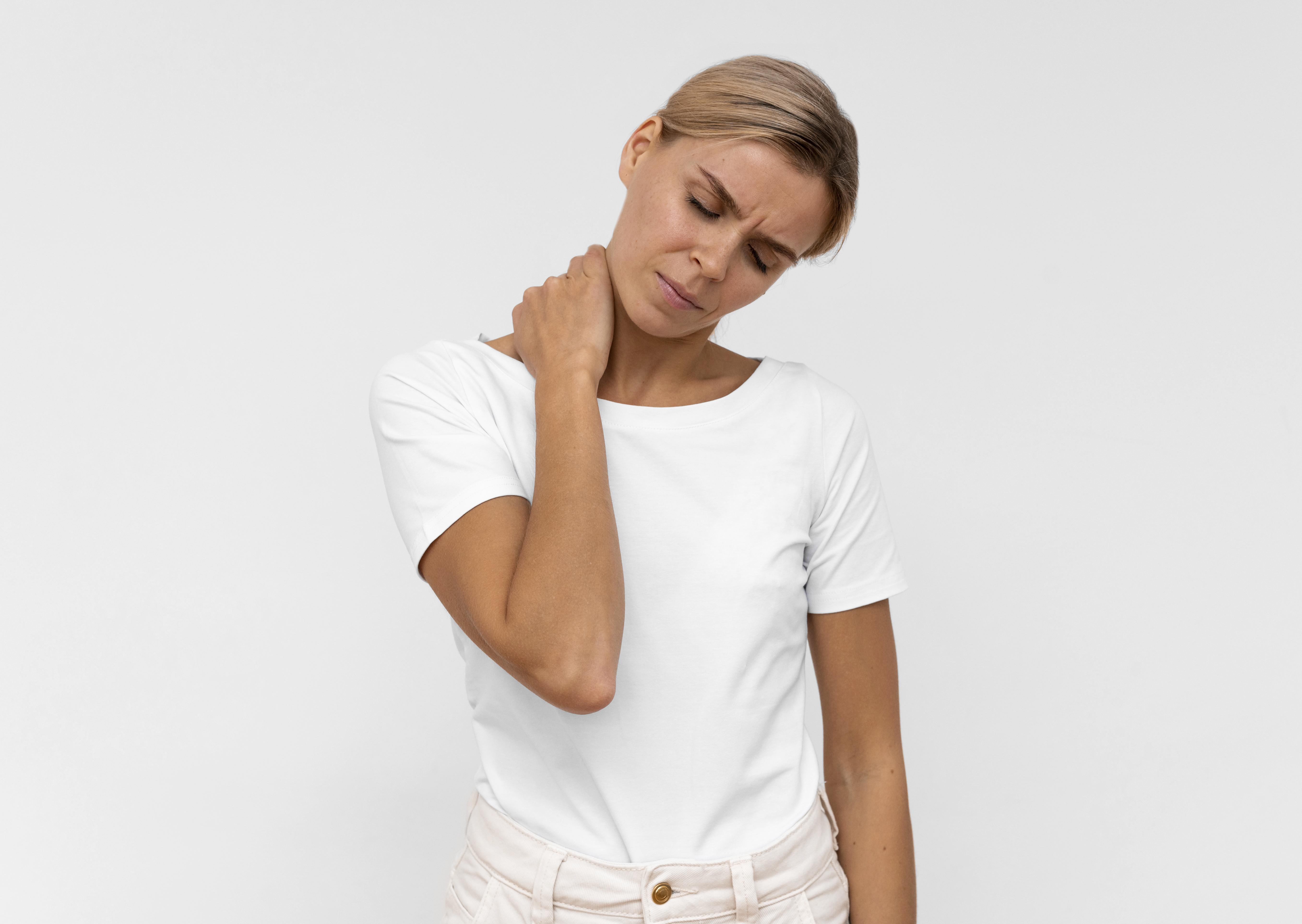 Person experiencing neck pain