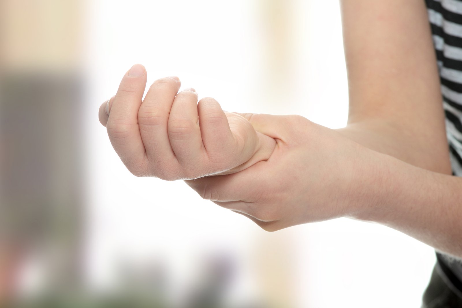 Person experiencing hand and wrist symptoms