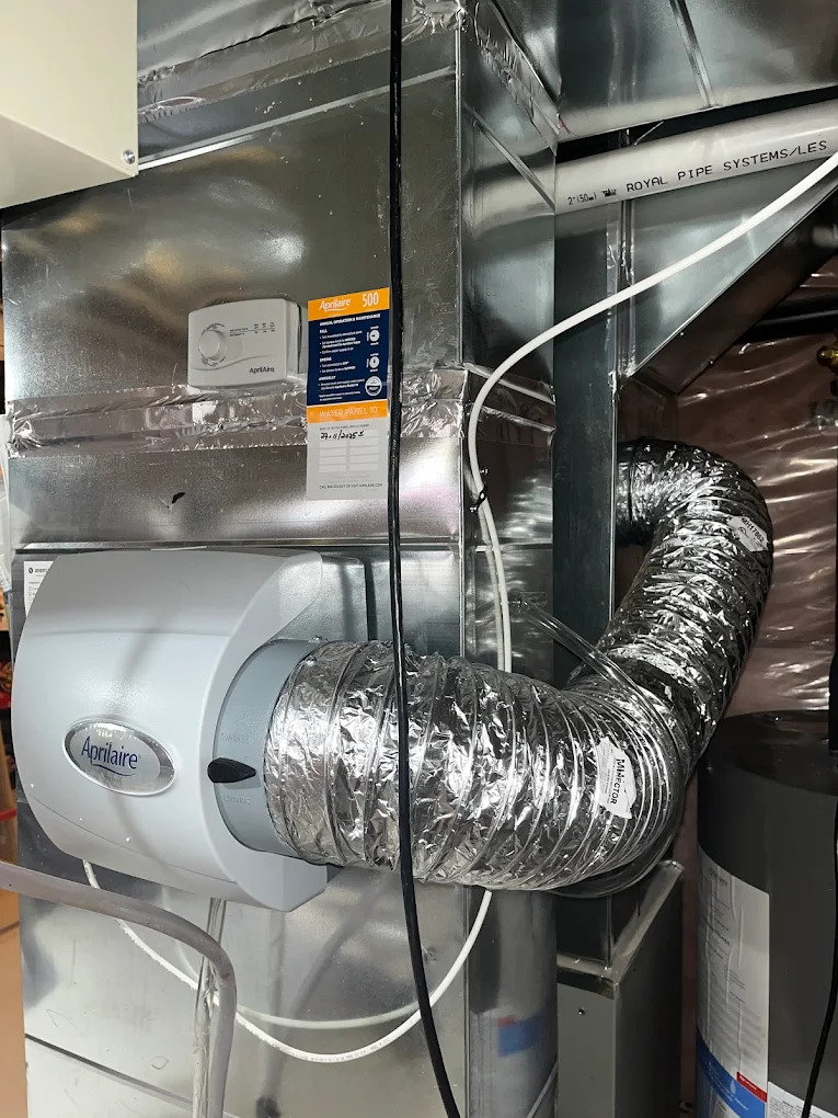 Aprilaire humidifier connected to residential ductwork