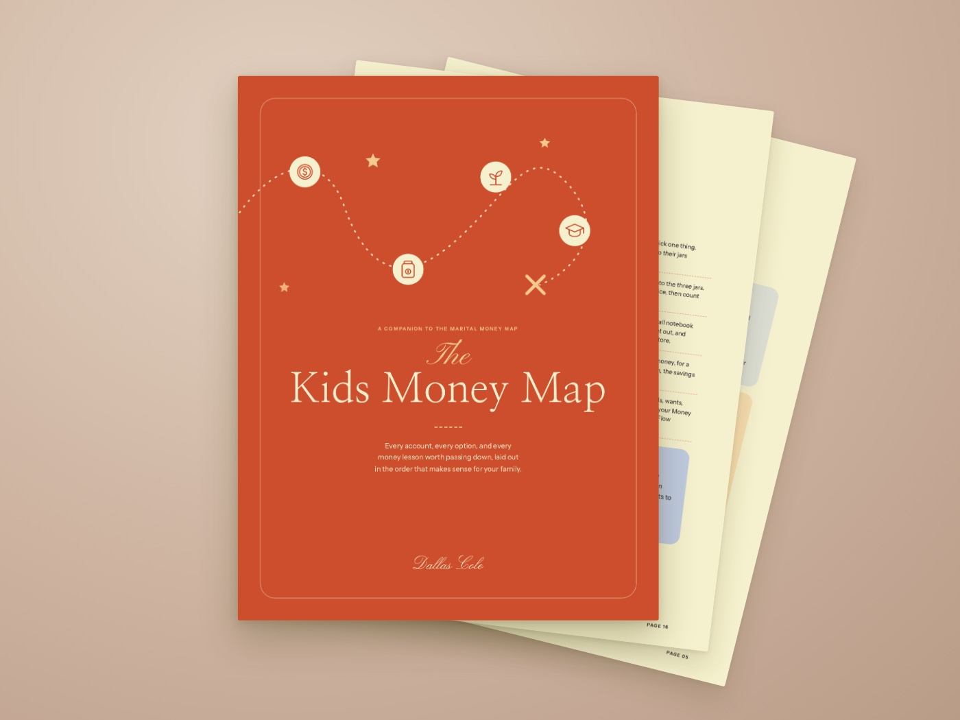 The Kids Money Map cover with two inside pages fanned behind it