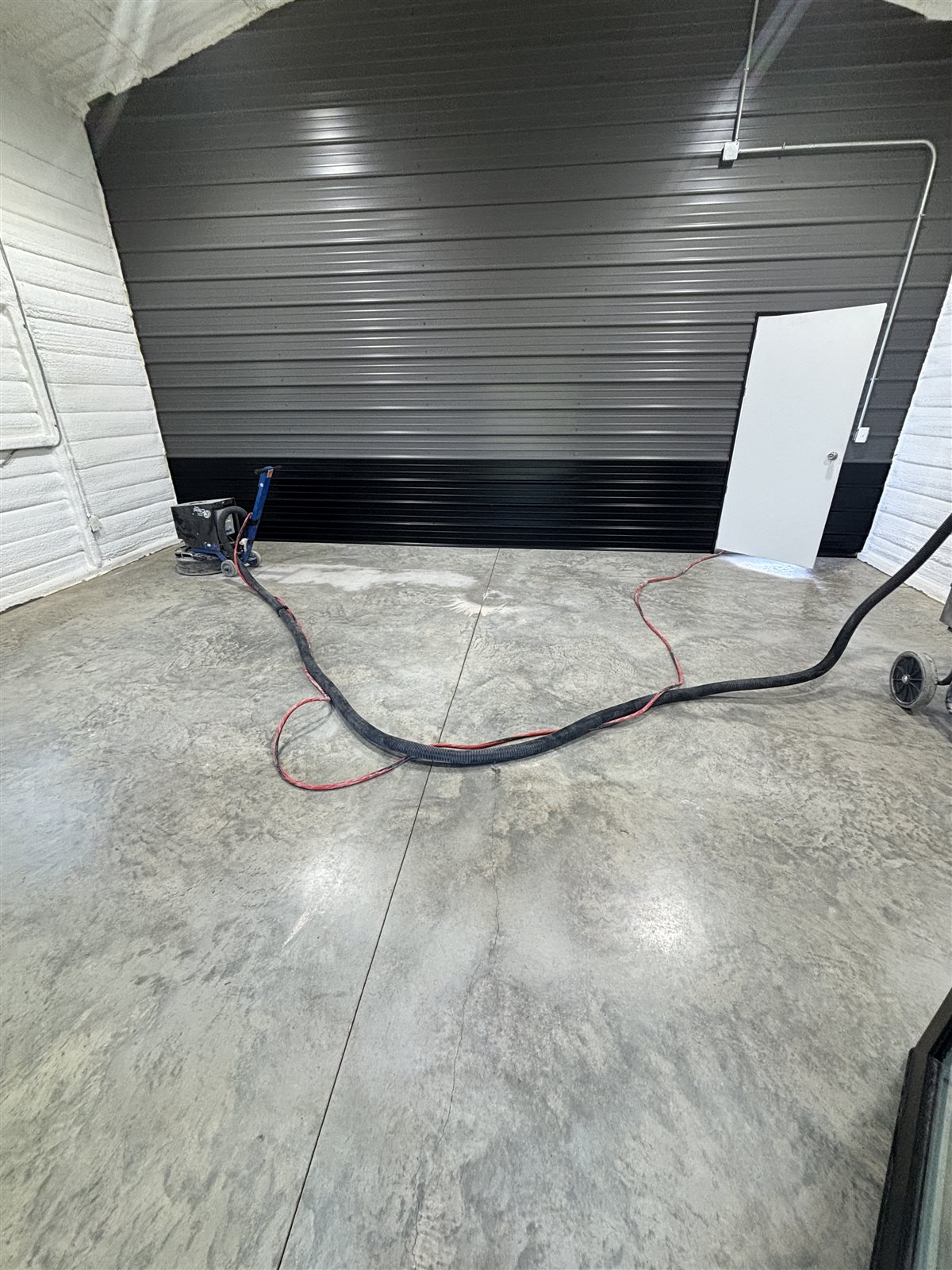 Shop floor in Midlothian, TX after diamond grinding, before coating