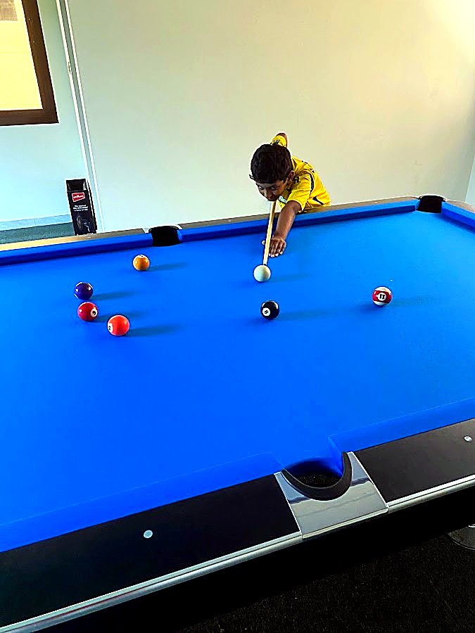 Player at Billiard Table