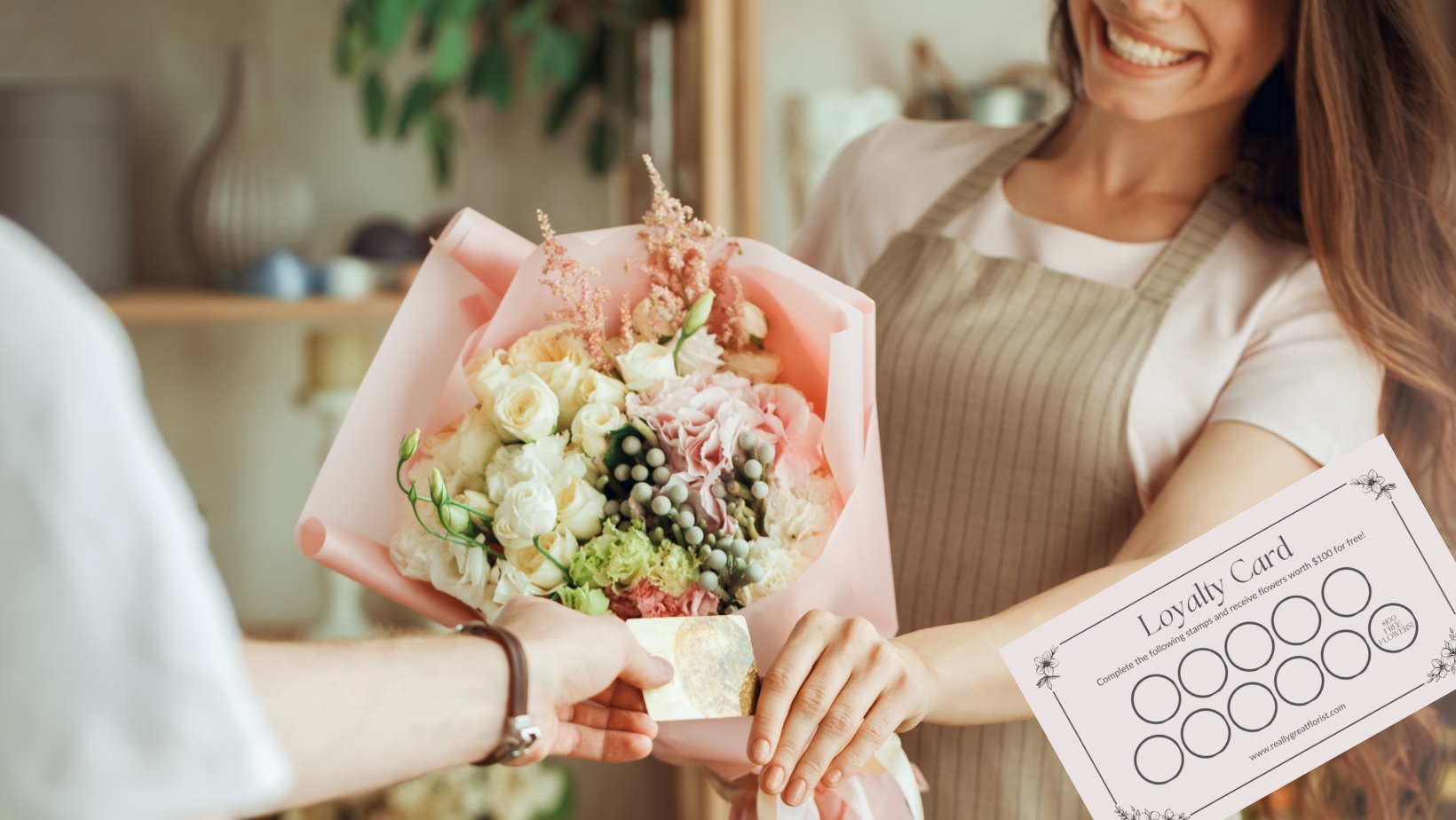 Florist handing a loyalty card to a customer — blooming benefits of a loyalty rewards program for your florist business