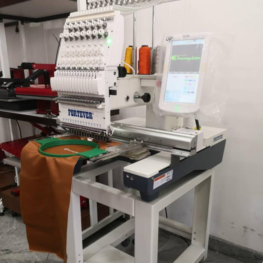 Flat table setup with hoop ready to stitch