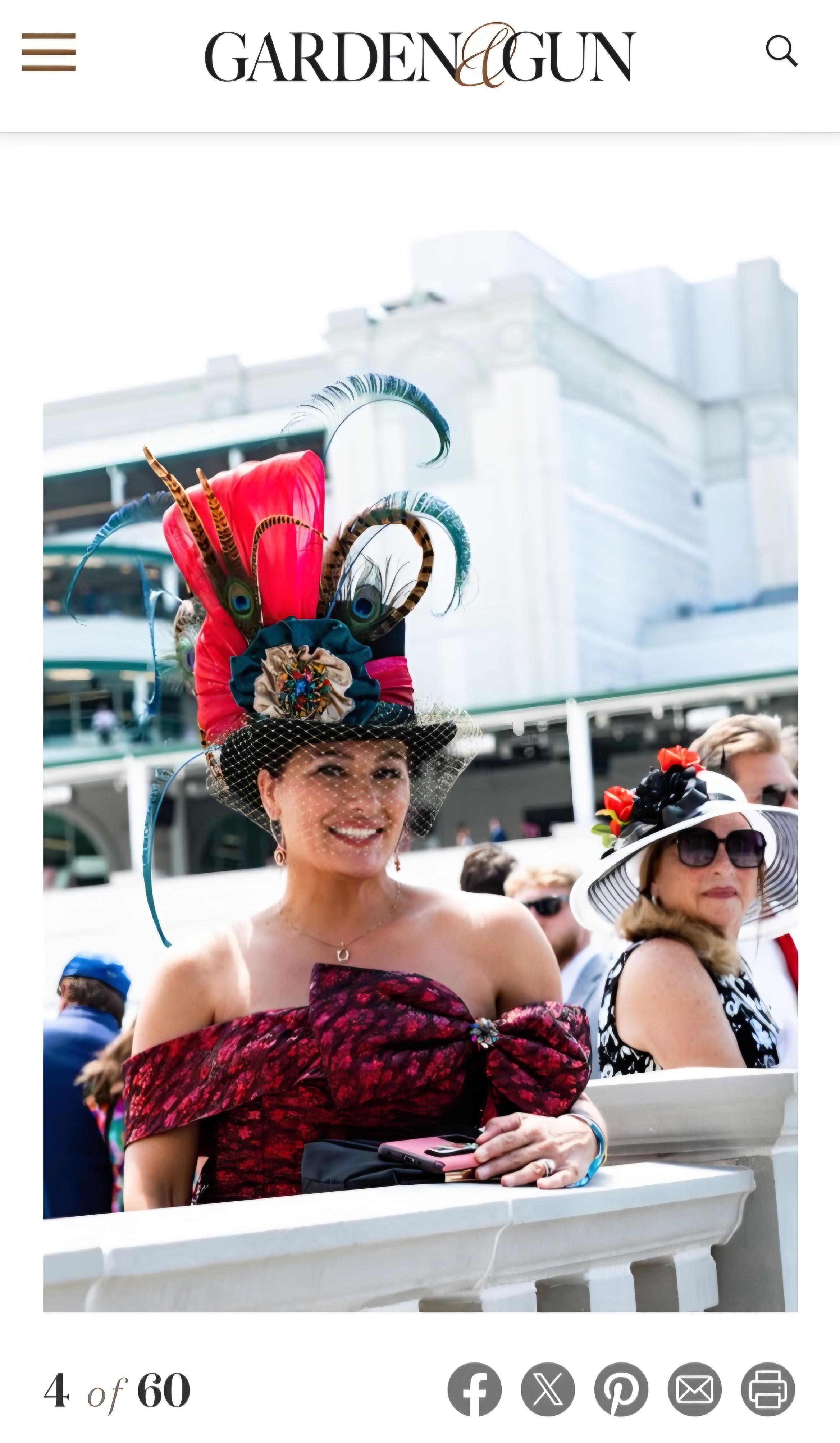 Kat In A Hat statement hat on the rail at the Kentucky Derby