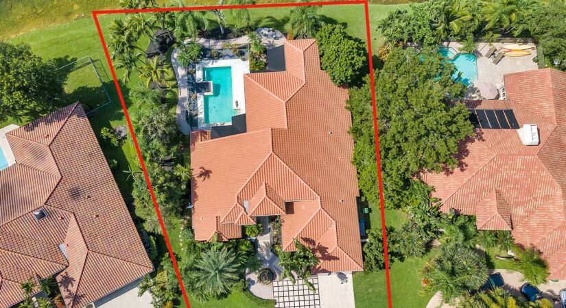 Aerial view of a residential property in Fort Lauderdale with a swimming pool and landscaped yard
