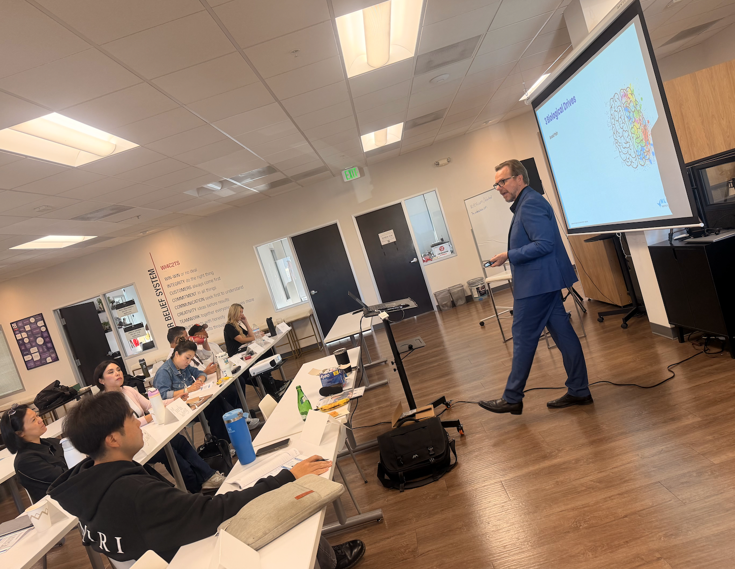Robert W. Harrison teaching a live professional coaching training session.