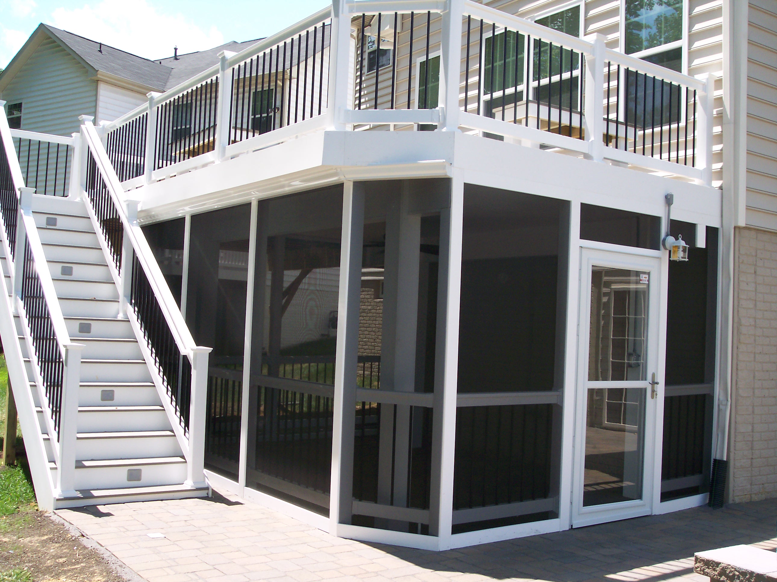 Two-level deck with screened porch by Maryland Decks and Hardscape