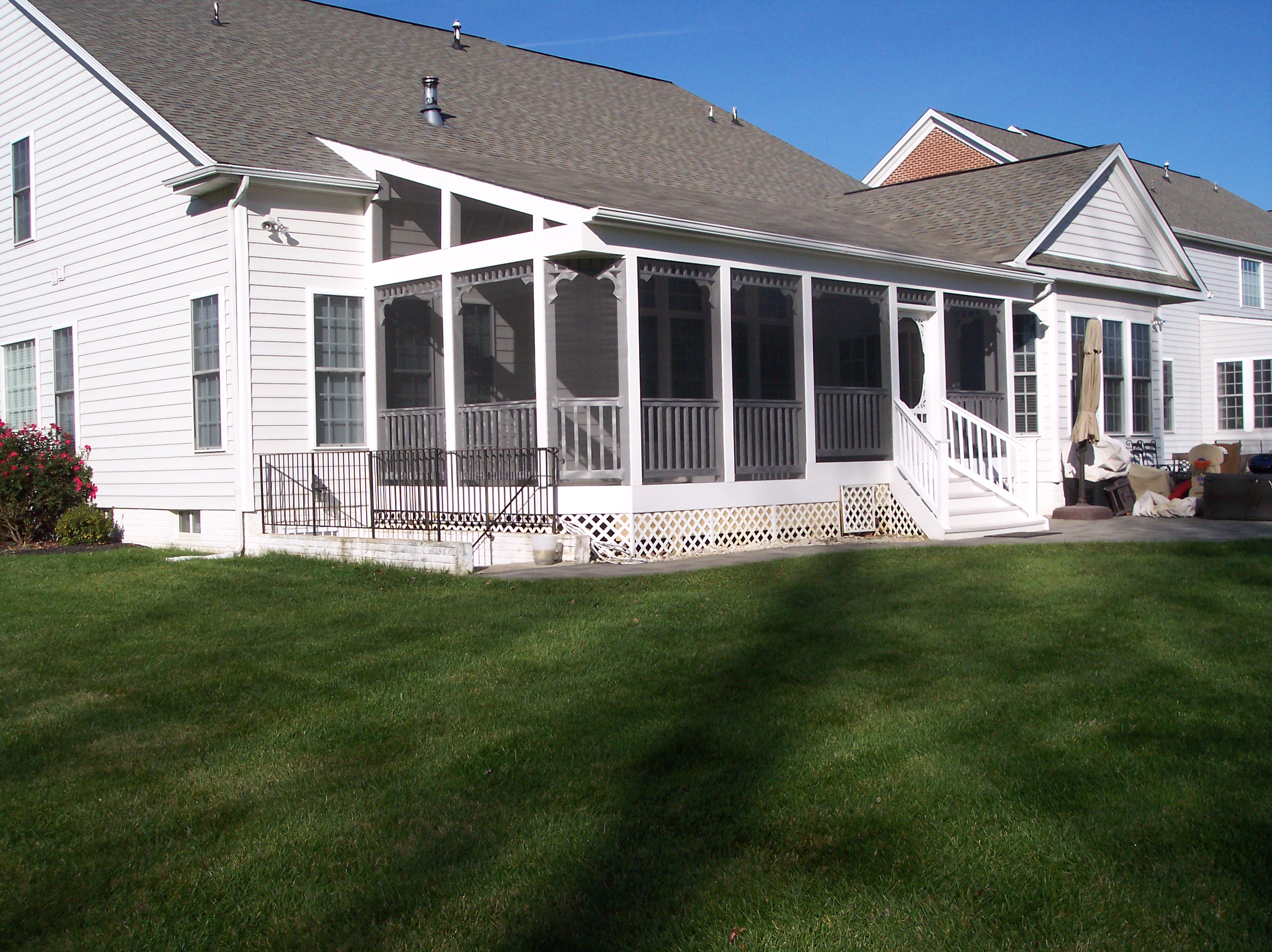 White screened porch by Maryland Decks and Hardscape