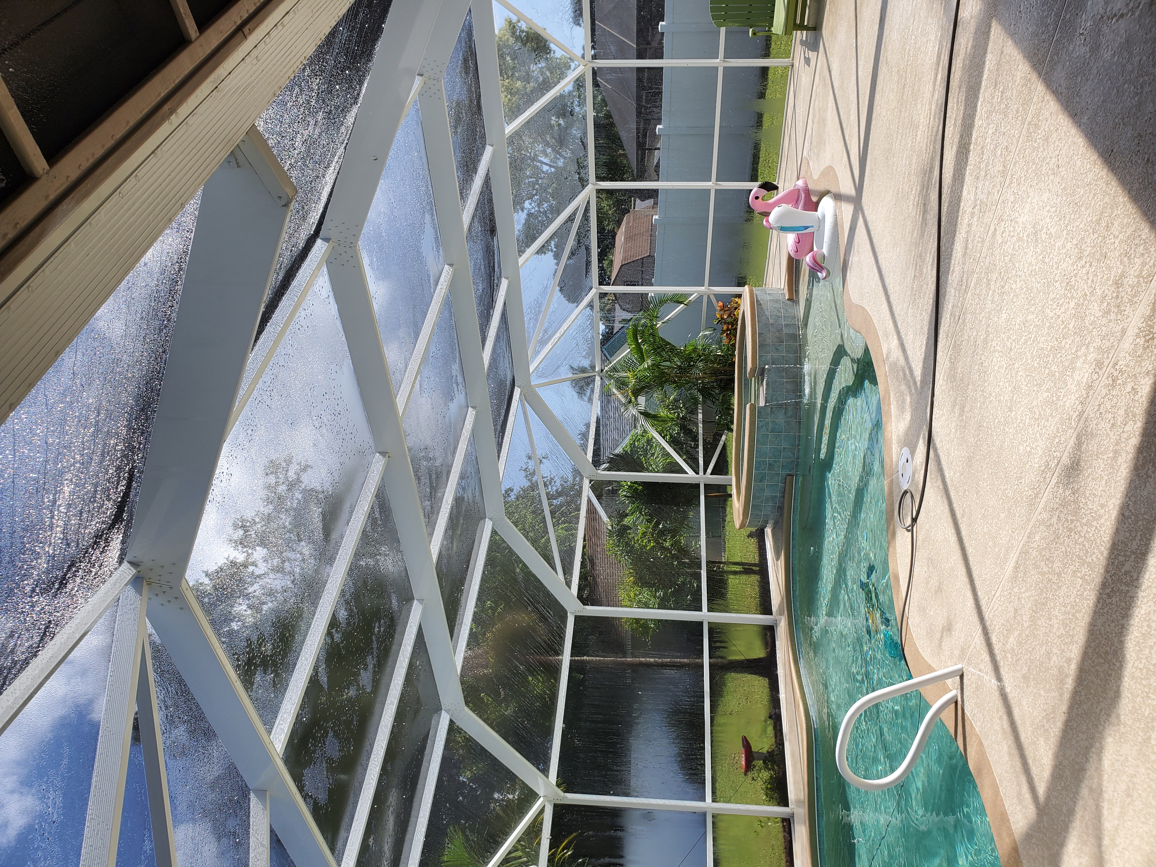 Pressure washing pool enclosure and patio Brevard