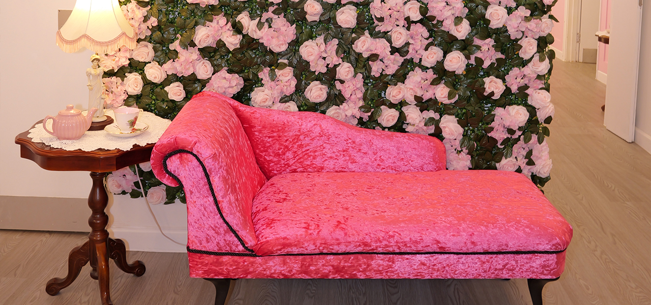 The chaise longue and flower wall