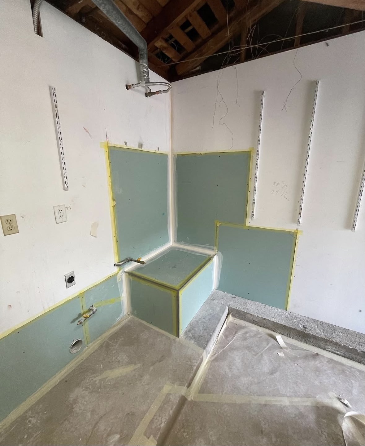 After — new drywall installed