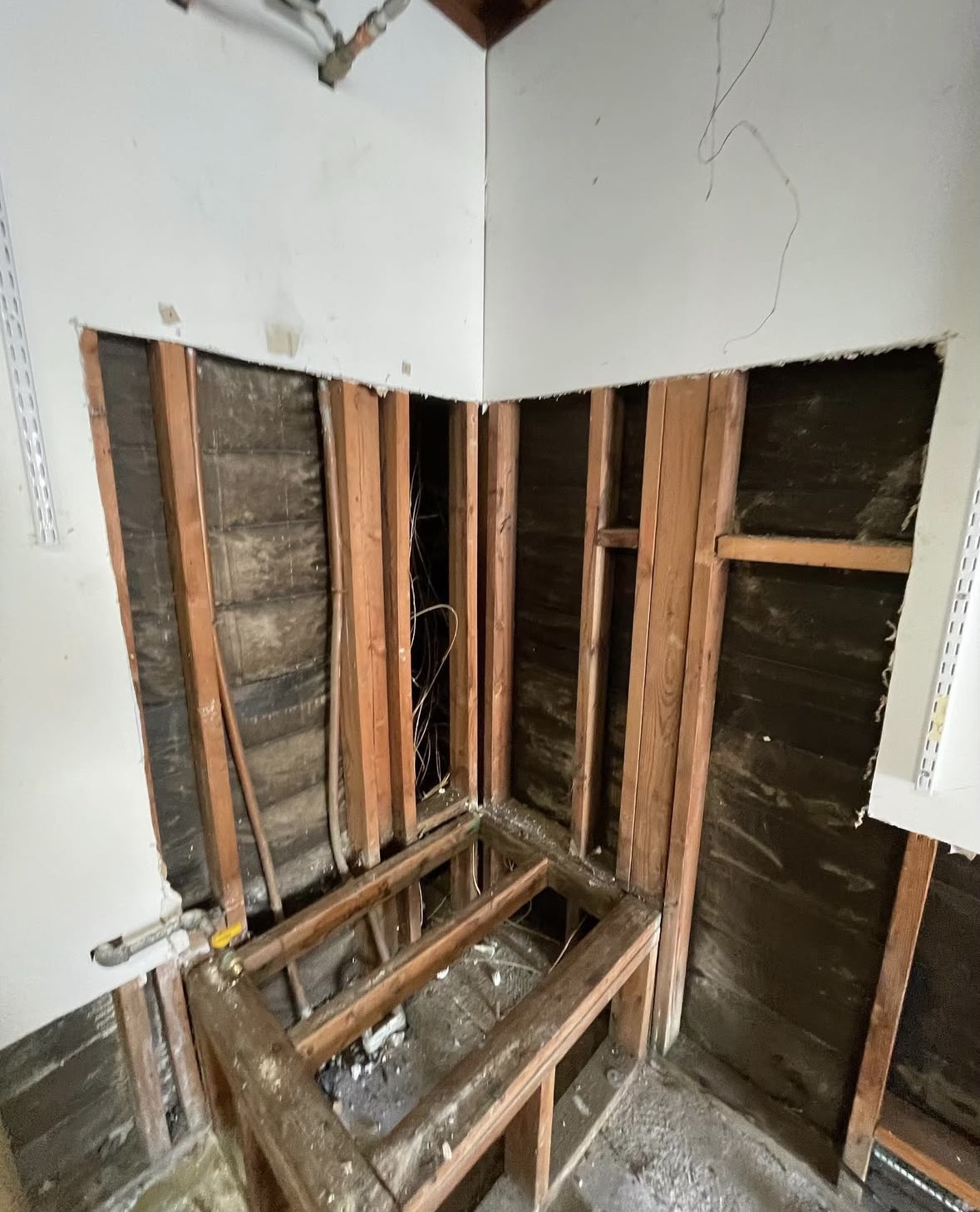 Before — water damaged drywall