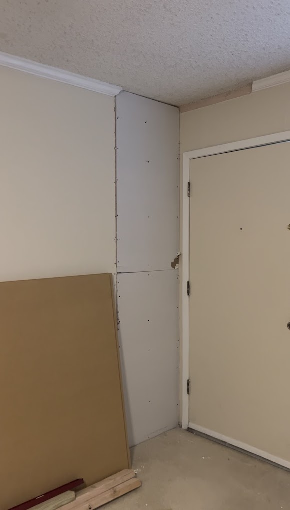 Before — hole in drywall