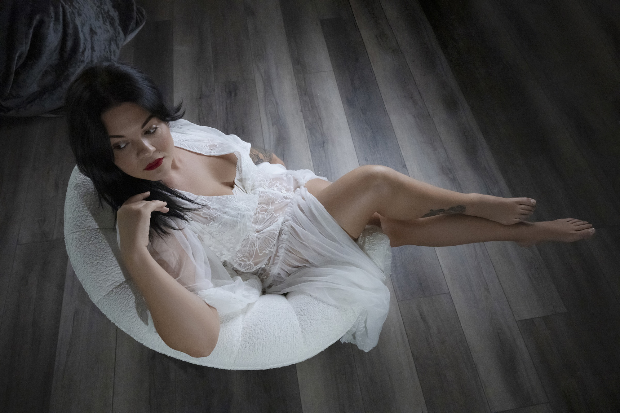 Woman in white robe boudoir dark hair Barb Hauser Photography