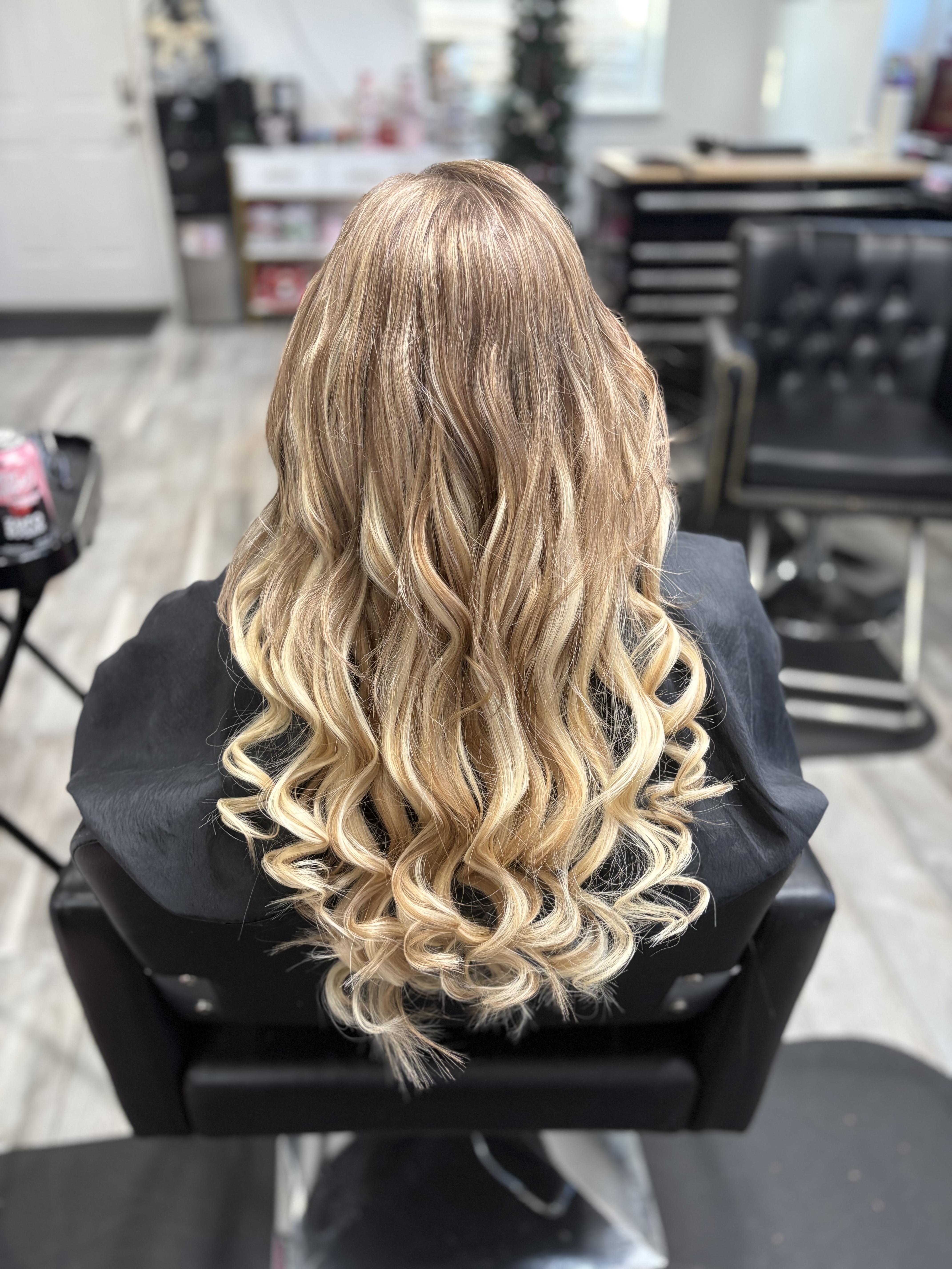 Natural-looking blonde hair extensions by Beauty Empowered
