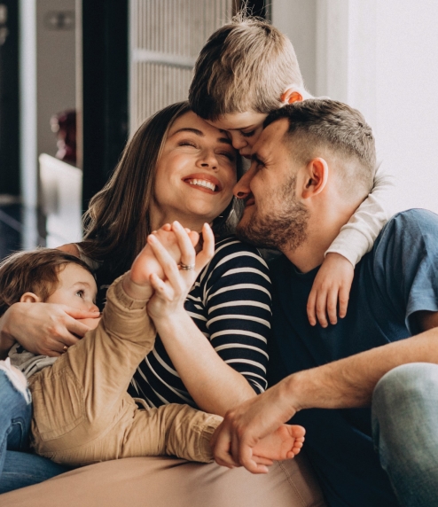 Atlantic Refrigeration technician cleaning and inspecting indoor air conditioner unit