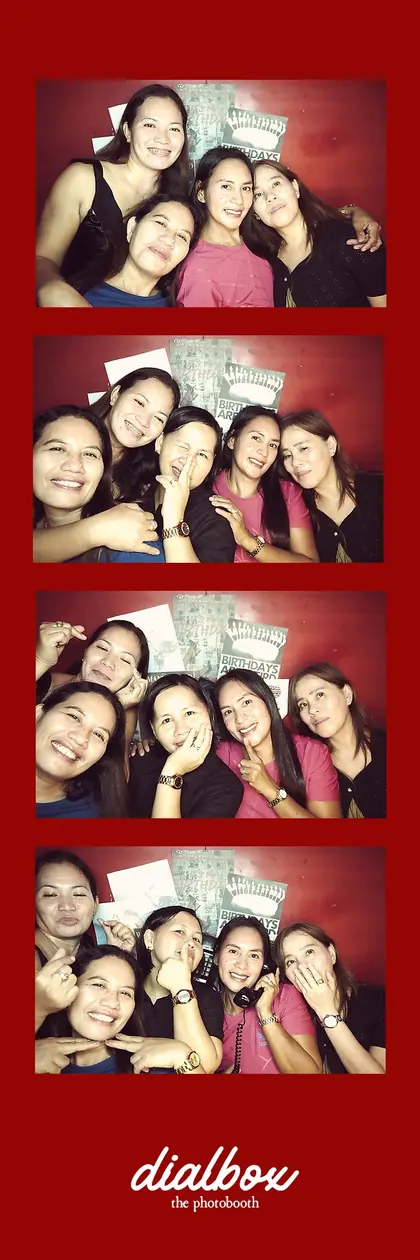A red Dialbox strip from a birthday party: four friends laughing