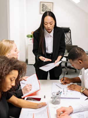 Professional woman influencing conversation without formal leadership title