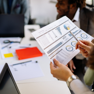 Automotive leader analyzing sales costs and referral program performance