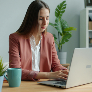 Professional woman balancing work responsibilities during personal hardship