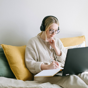 Young woman evaluating essential and preferred qualifications in a job description Young woman evaluating essential and preferred qualifications in a job description