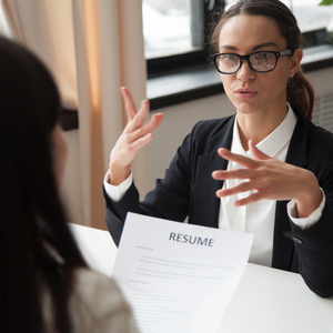 Woman explaining transferable skills during a job interview Woman explaining transferable skills during a job interview