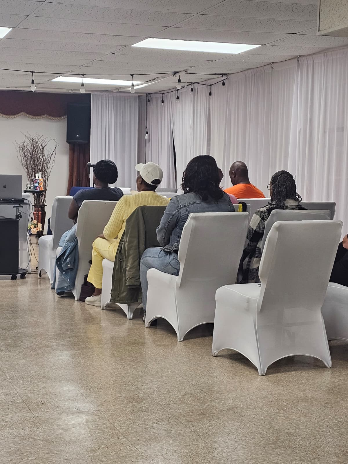 Seated gathering, community in session