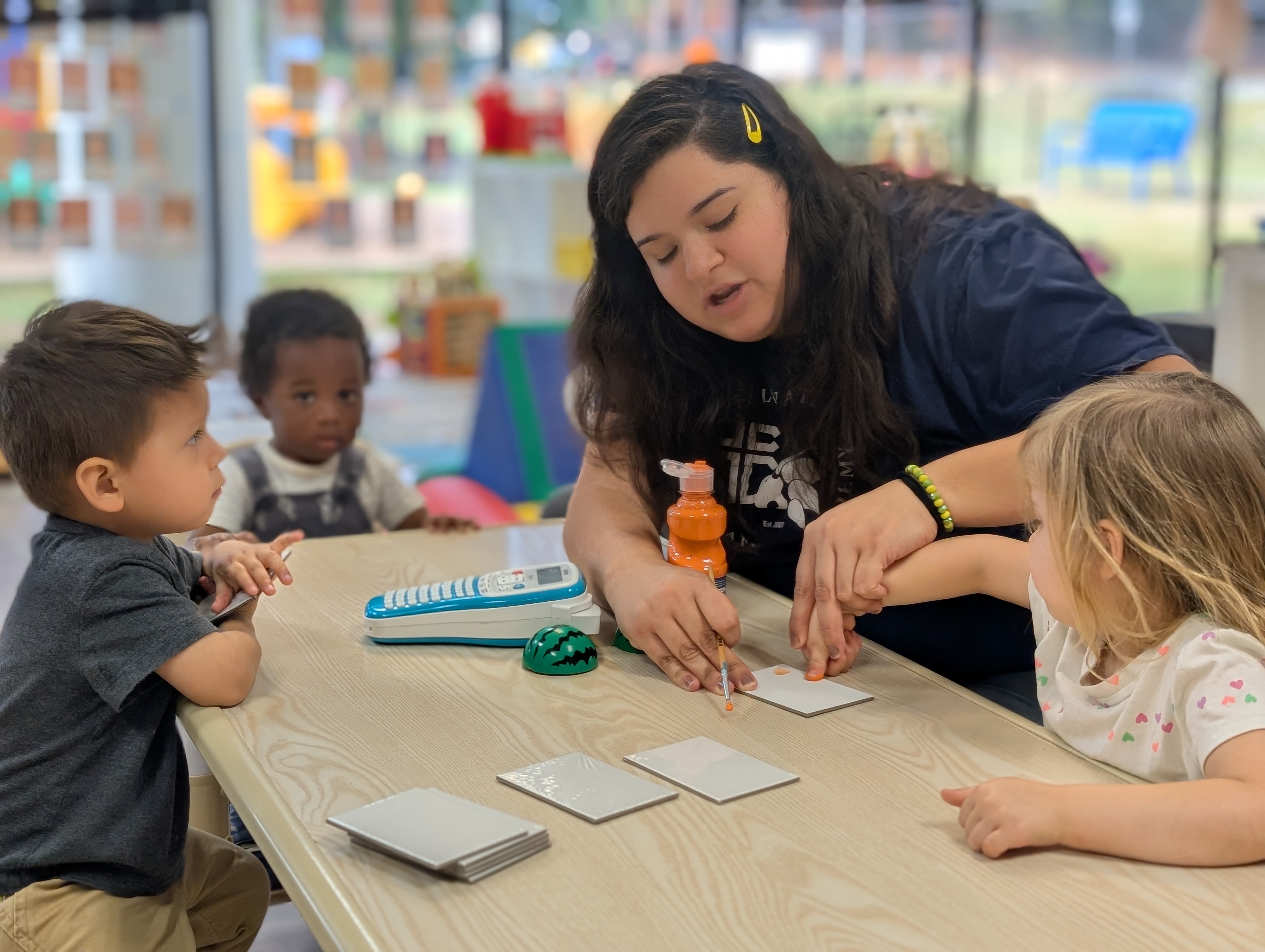 A warm classroom moment at Still Waters International Academy